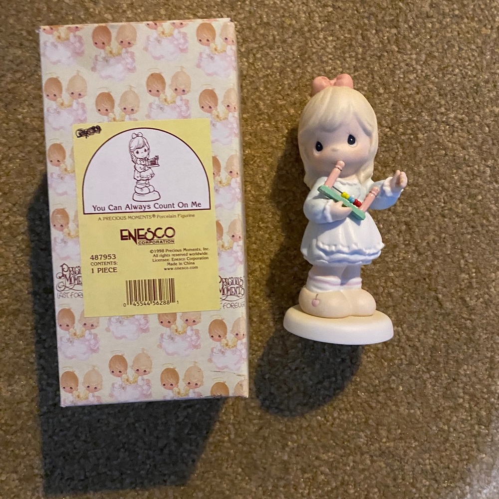Precious Moments figurine.